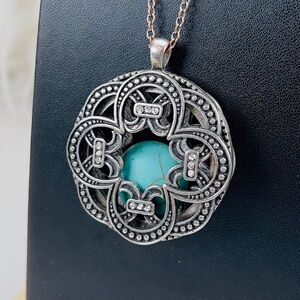 Beautiful aged Silvertone pendant, blue floating center costume long necklace